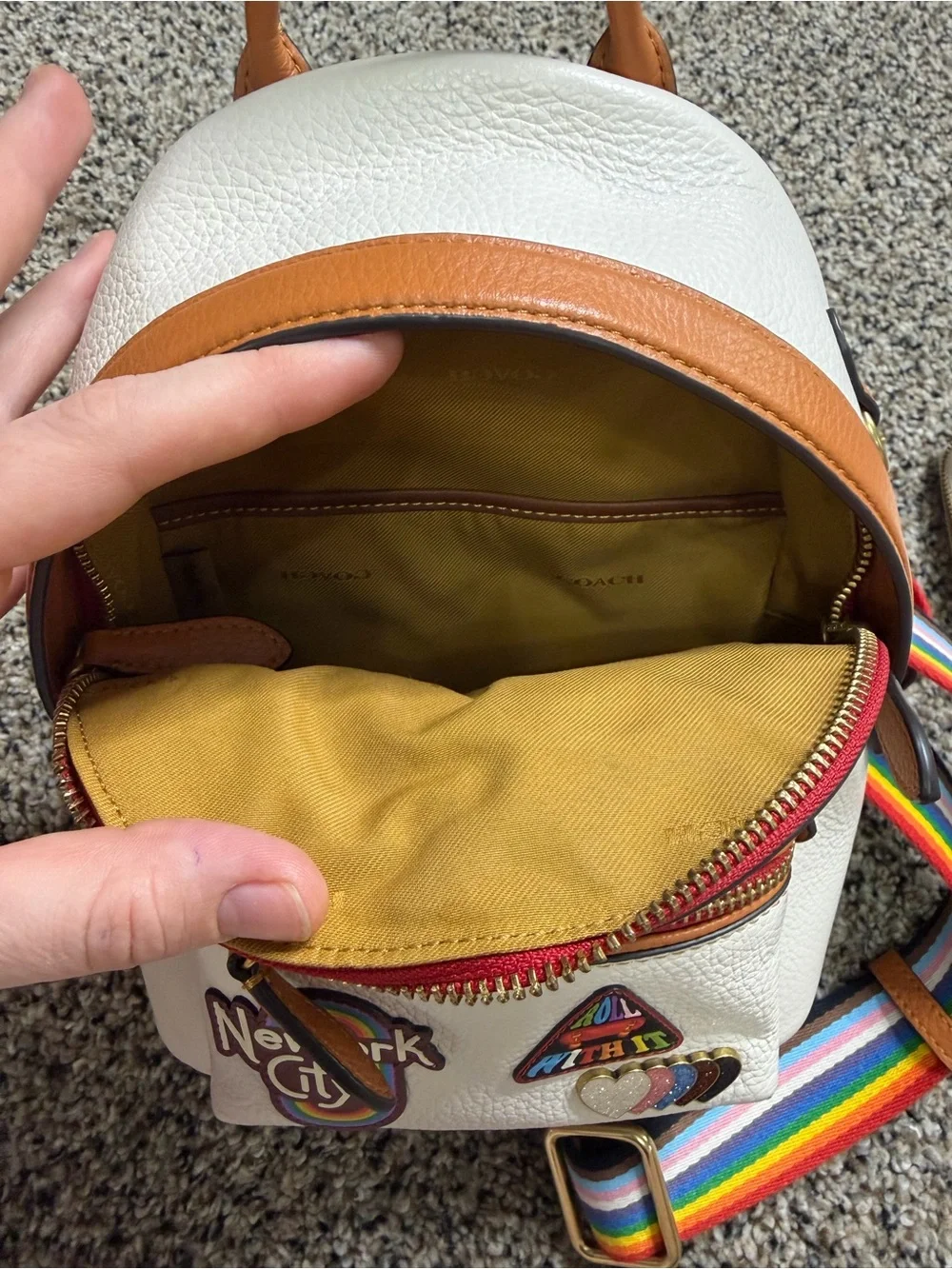 Coach White Mini Backpack with Brown Interior and Rainbow Strap